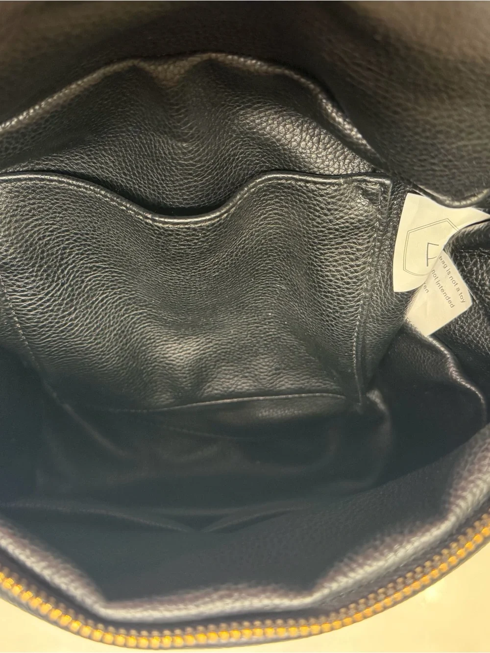 FAWN DESIGN Black Pebbled Leather Backpack with Gold Hardware